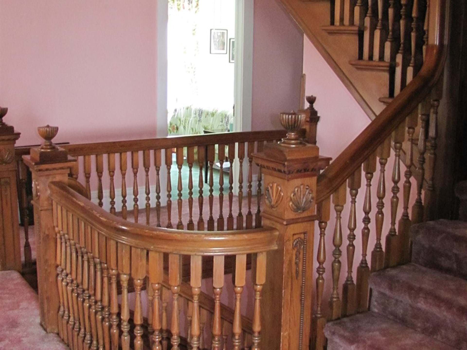Beautiful hand carved staircase.