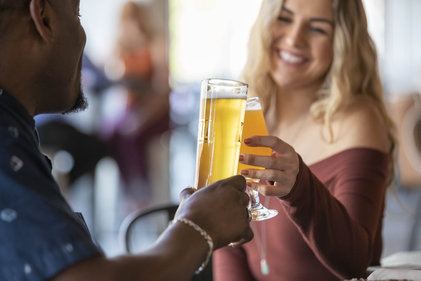 Woman holding a beer