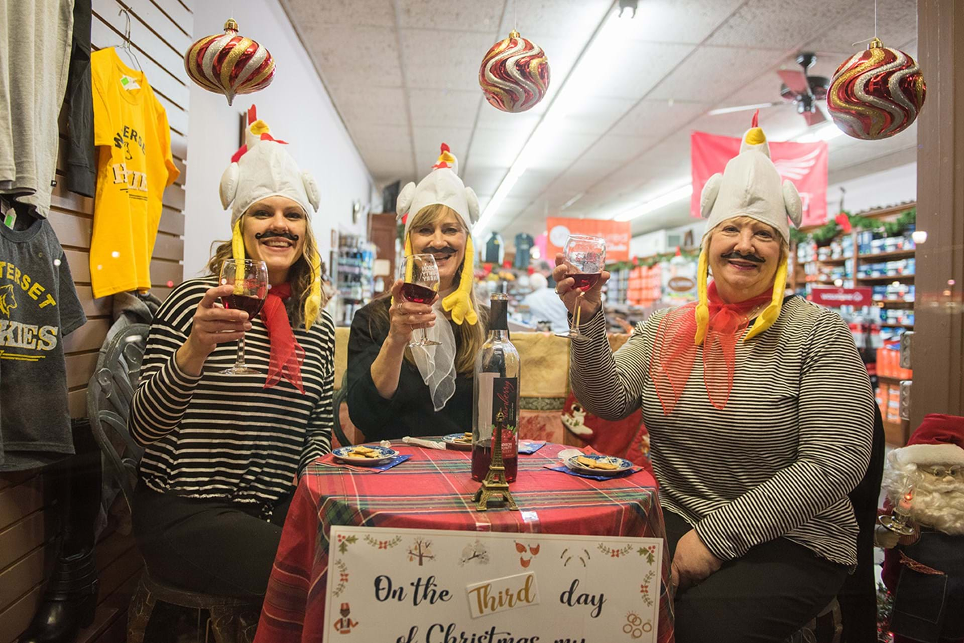 A live window display during the Winterset Festival of Lights (Three French Hens)