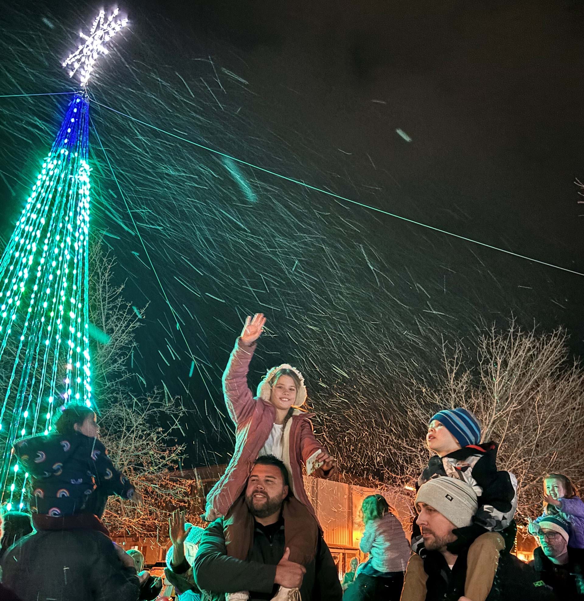 End the night with a magical snowfall around the Uptown show tree