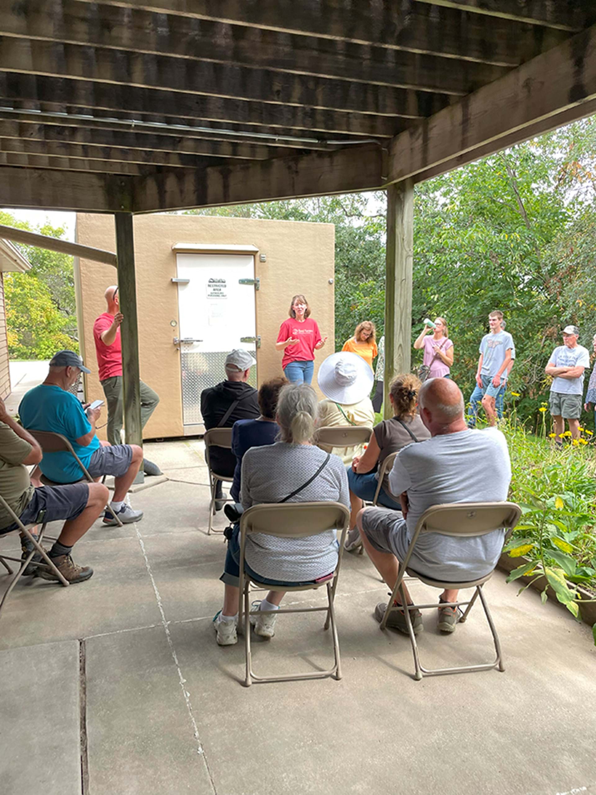 Presentation outside of the seed vault at Heritage Farm