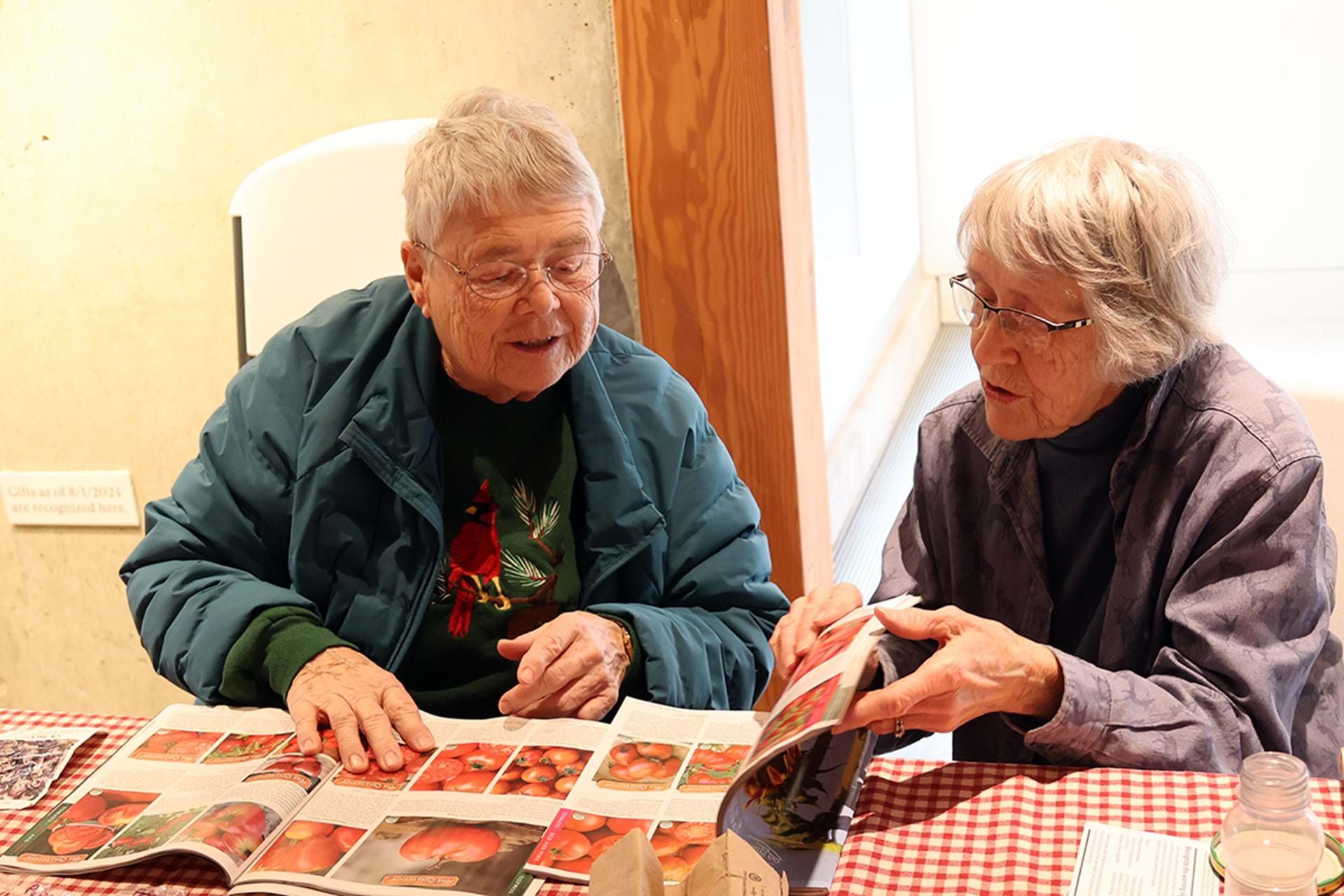 National Seed Swap Day participants pour over seed catalogs