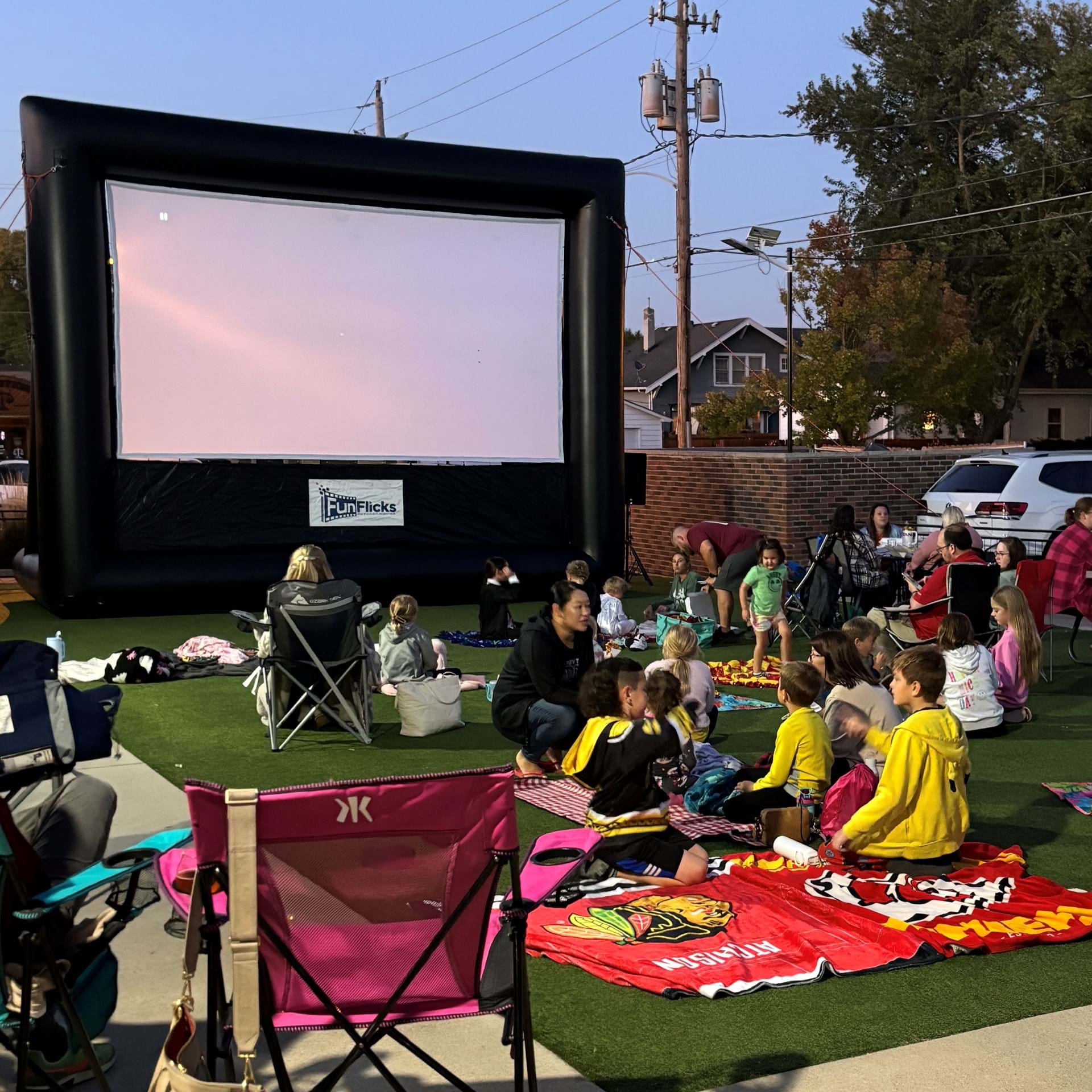 Bring blankets and lawn chairs to relax on the turf for a one-of-a-kind movie experience.