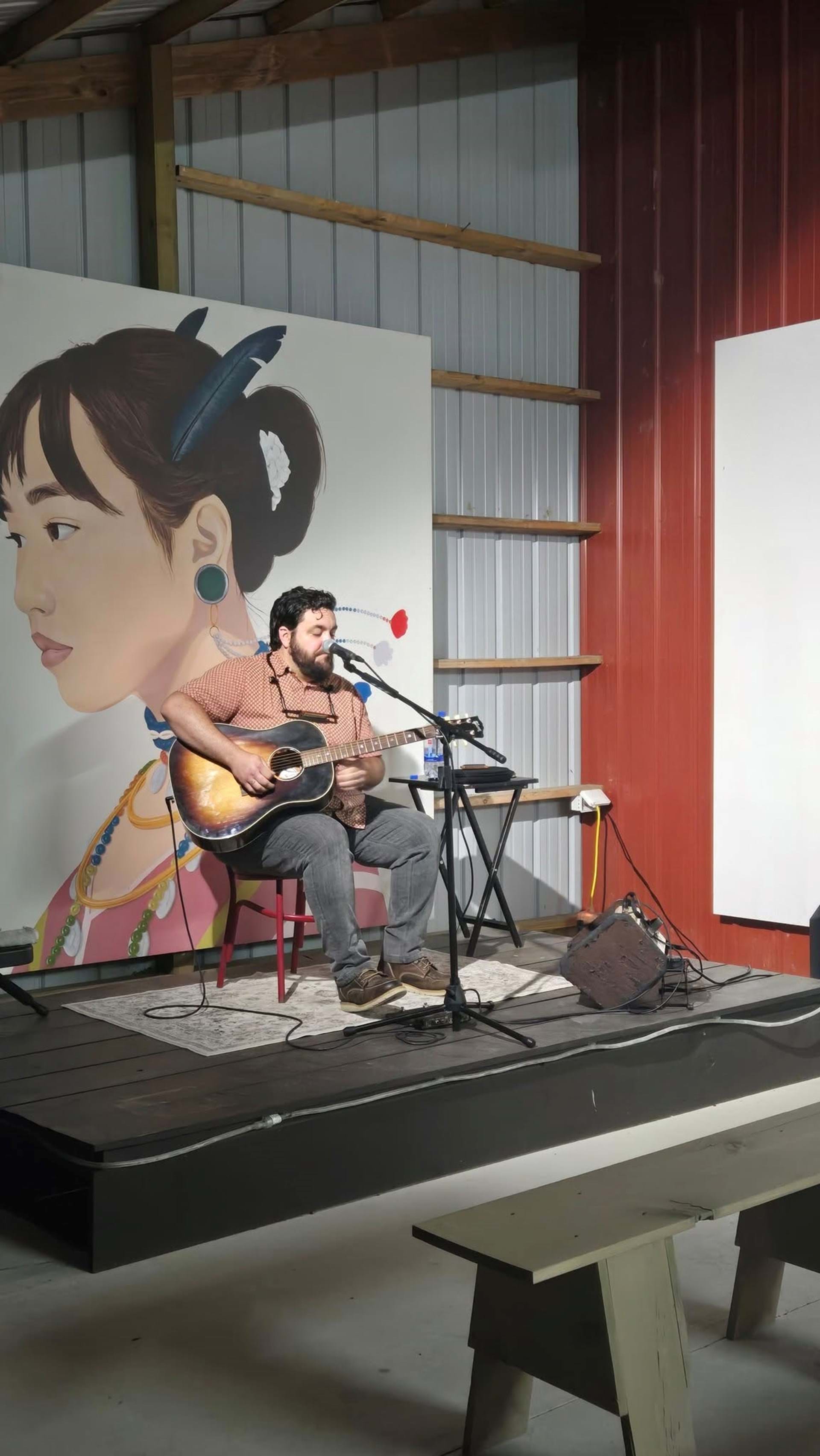 Jordan Messerole performing at Art Farm Iowa 