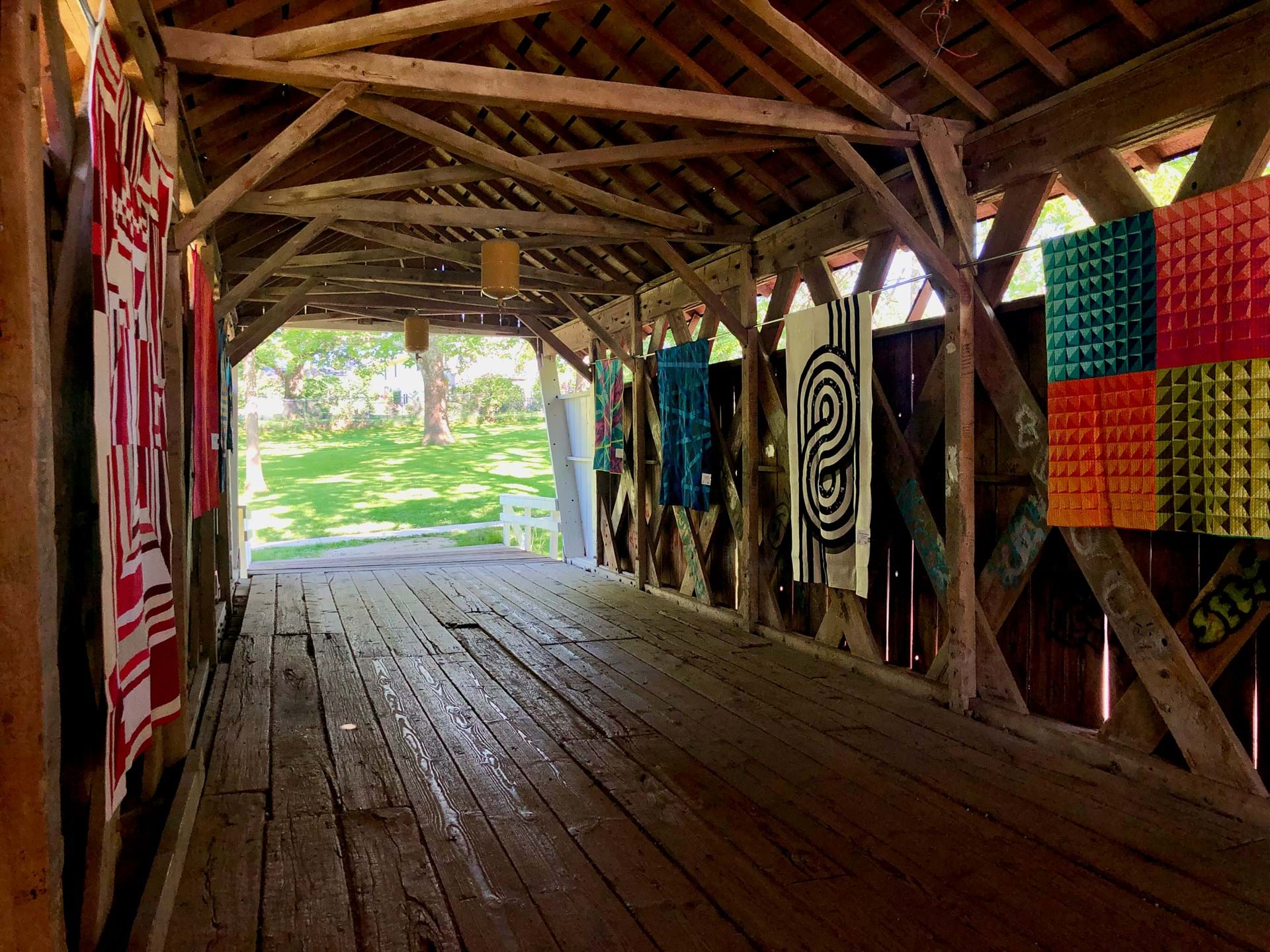Airing of the Quilts - Quilts hung on the covered bridges