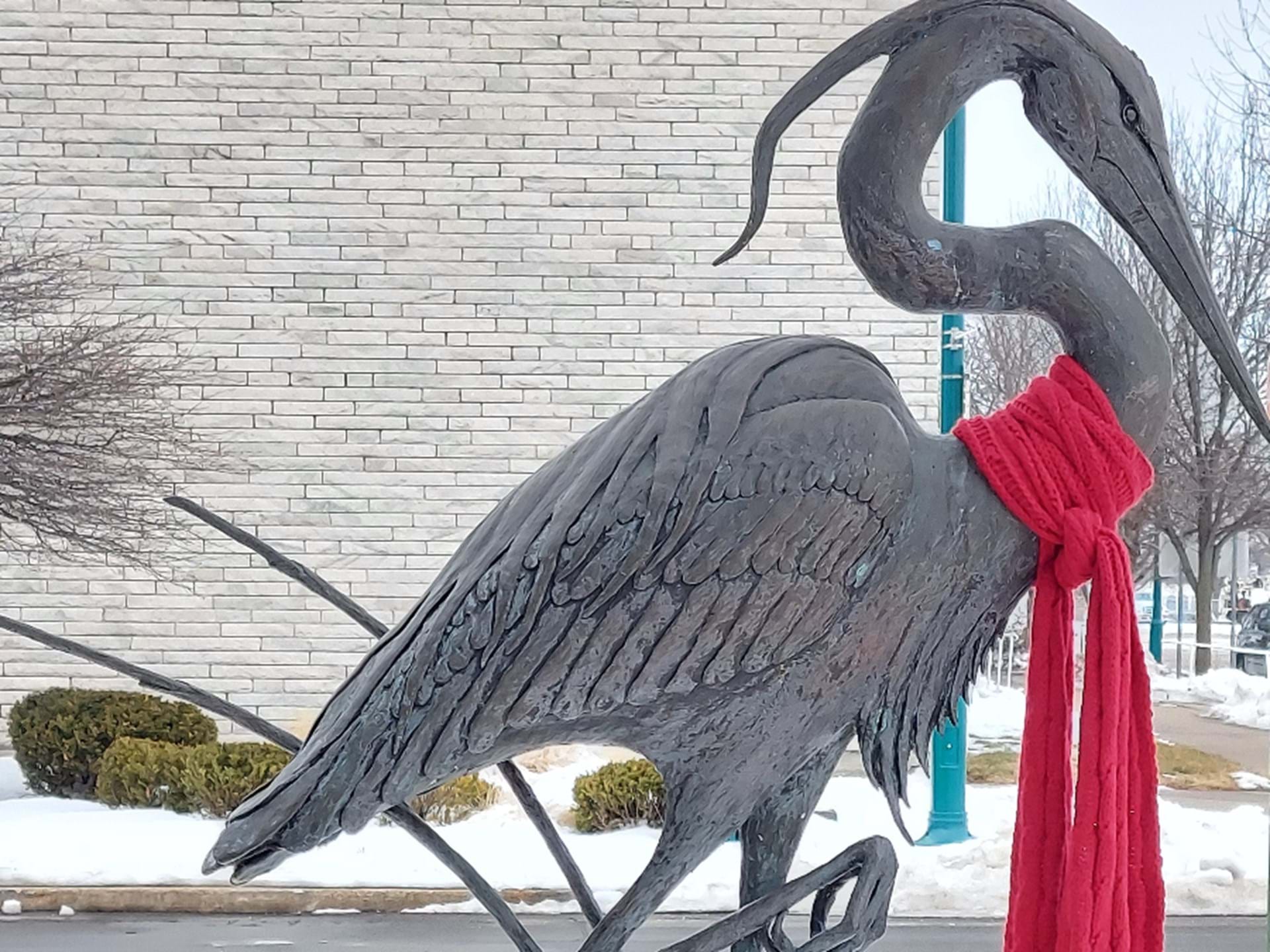 Heron statue in winter
