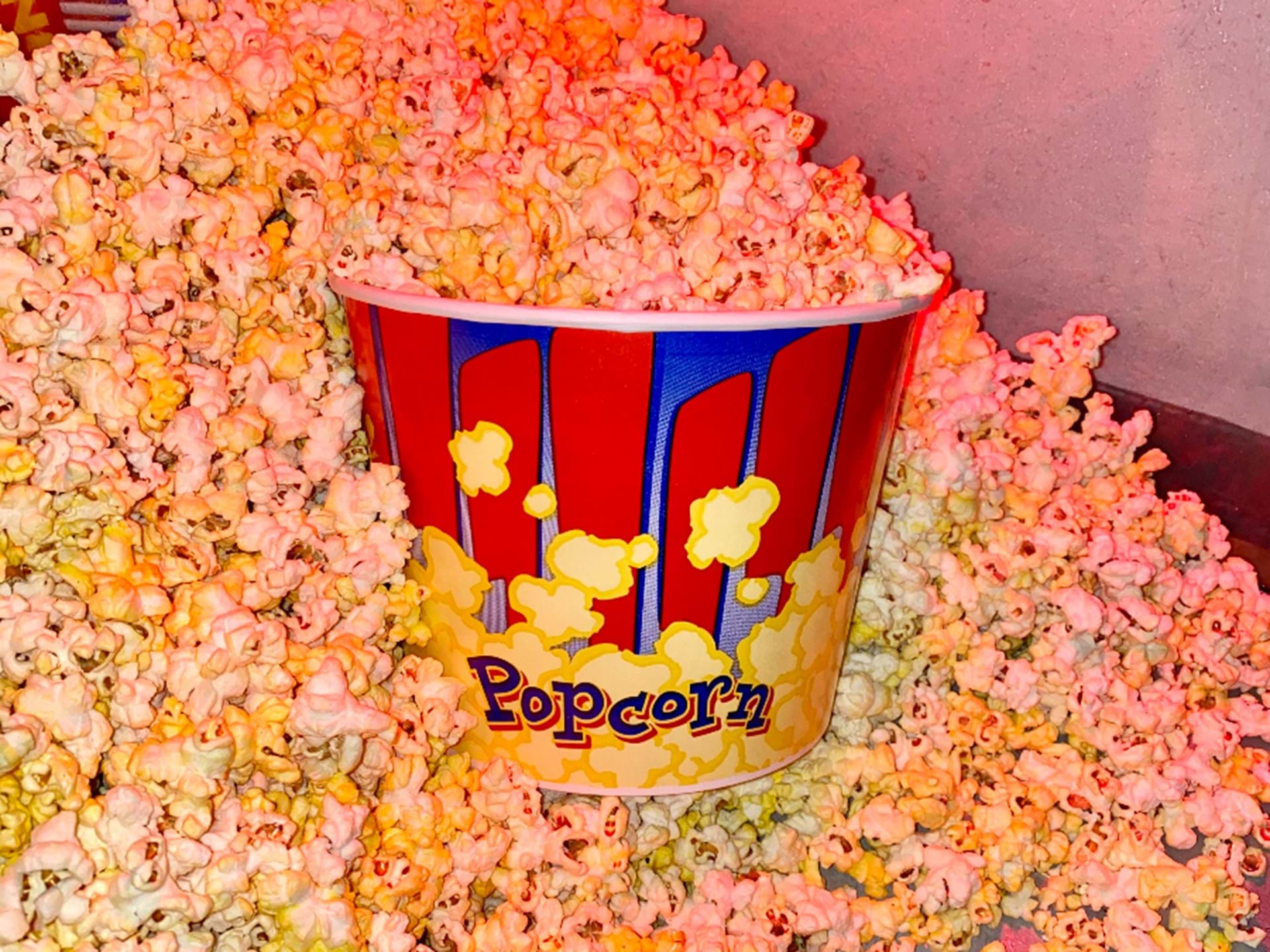 Popcorn is a must at the movies & ours is popped in a retro Manley machine. A large bucket with butter is just $3!