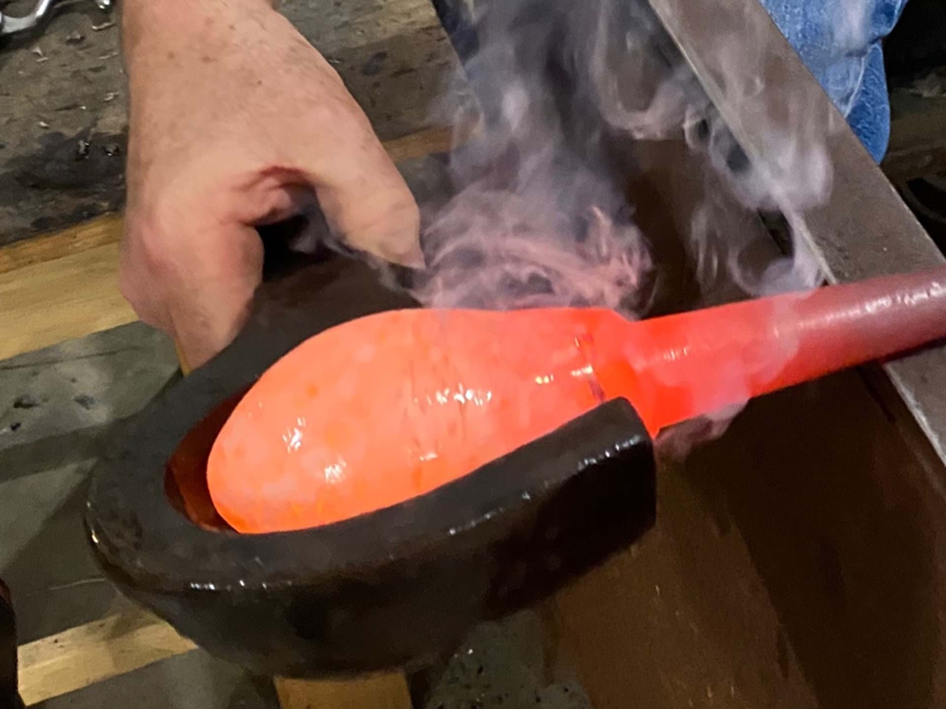 Shaping molten glass