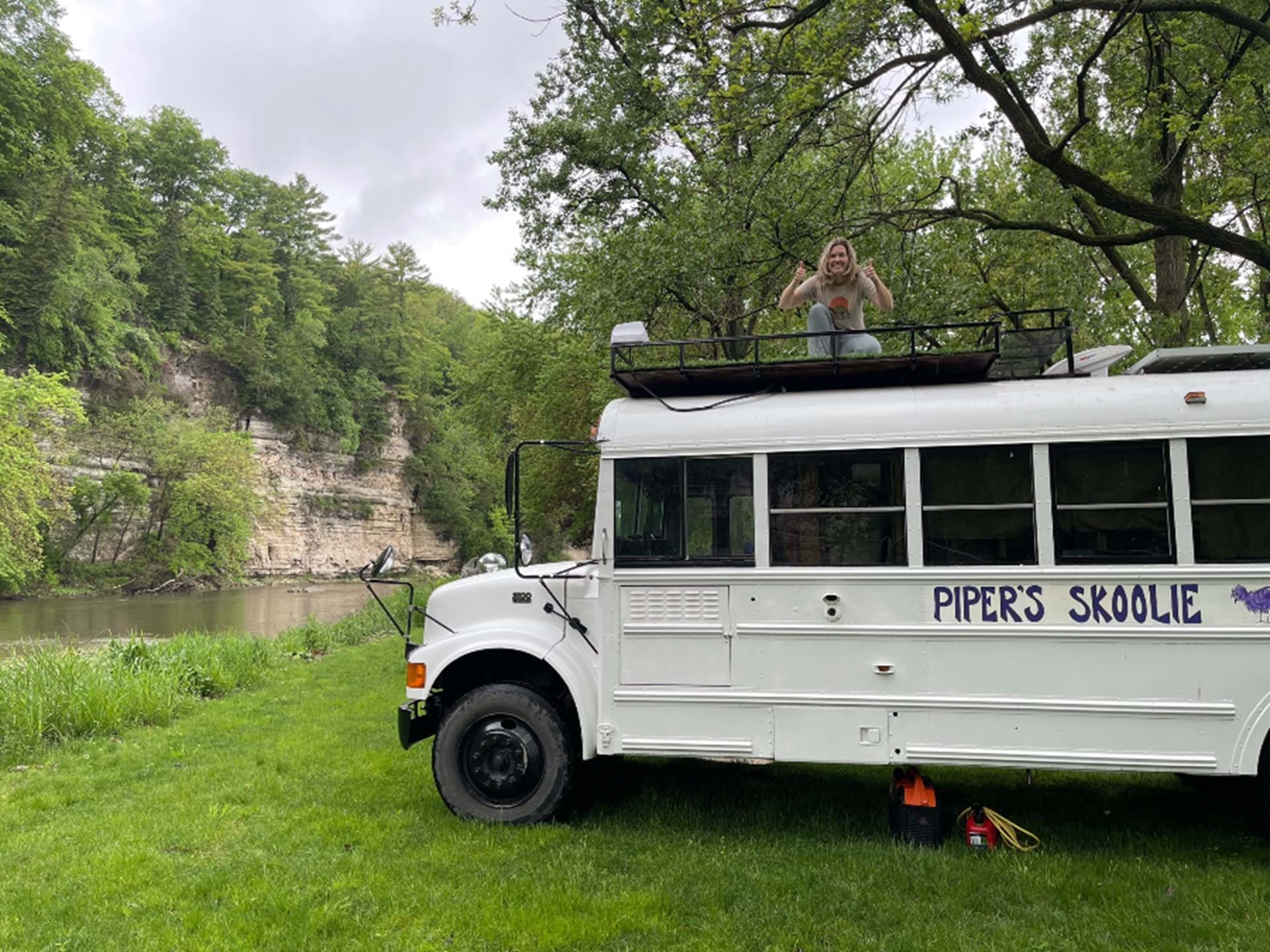 The Skoolie is parked along the Upper Iowa River in Bluffton, Iowa.