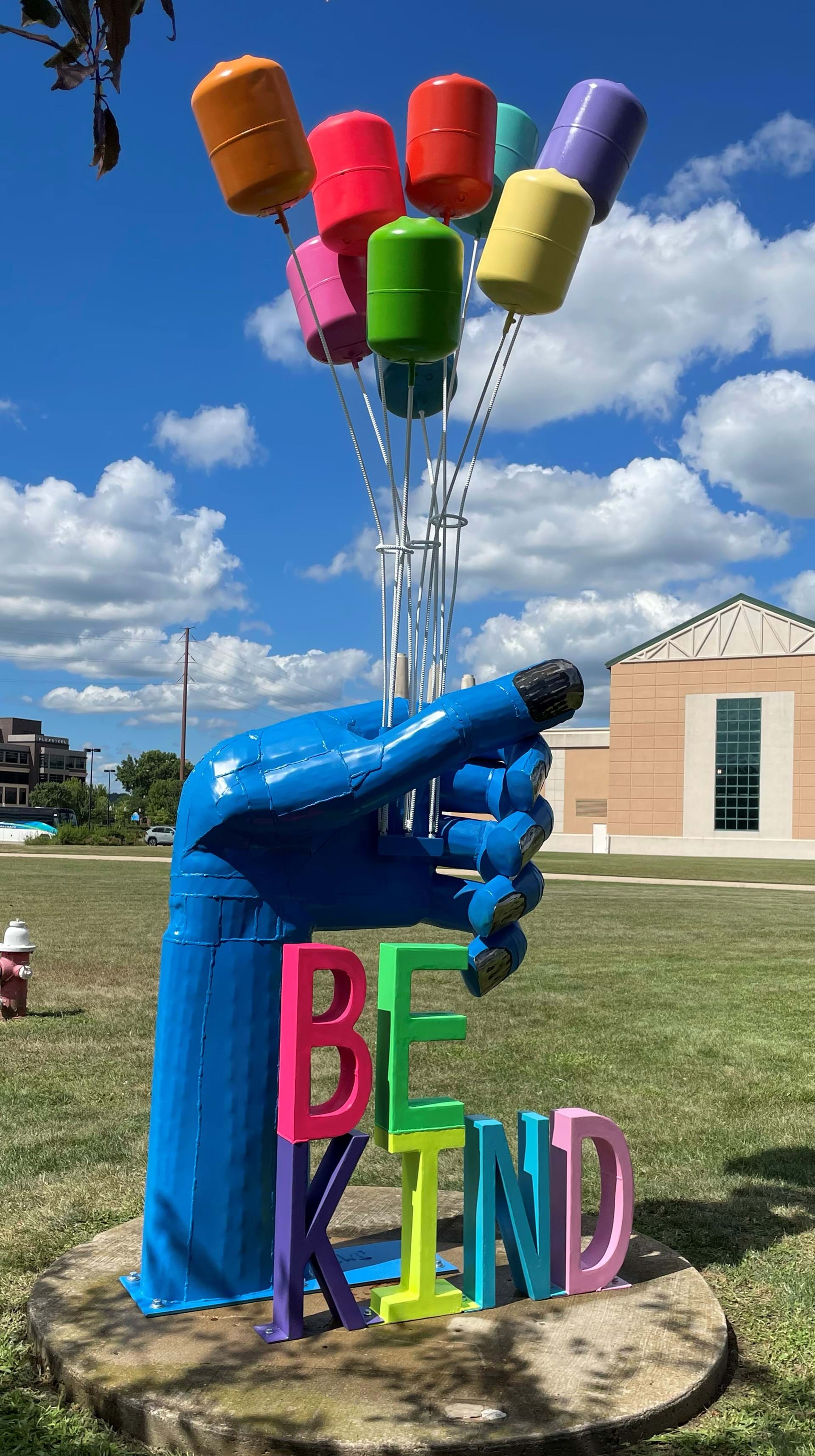 Be Kind by Joe & Terry Malesky of Stratford, MO. On display through end of July 2023 along the Mississippi Riverwalk in the Port of Dubuque.