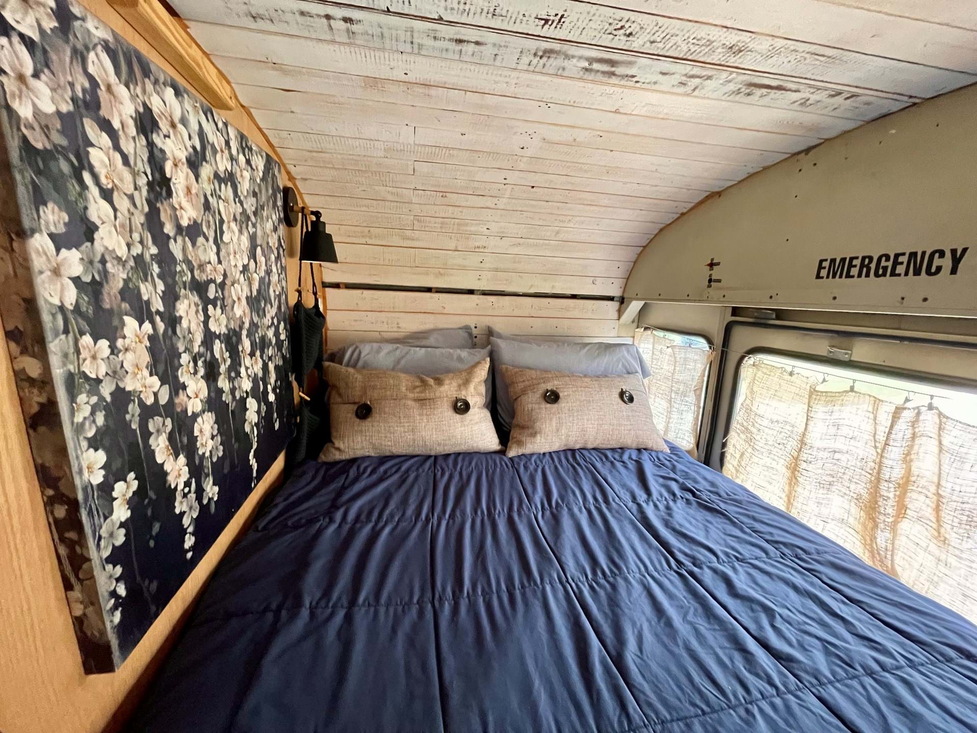 Full sized bed located in the bus as well. 