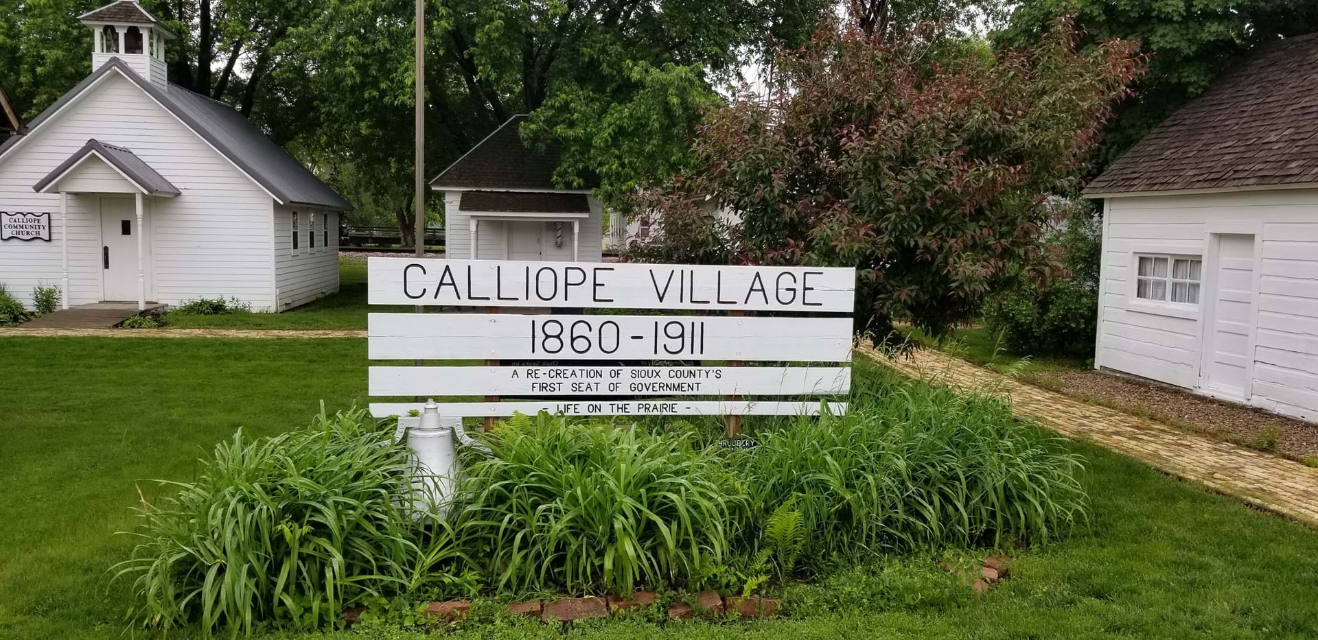 Calliope Village Welcome Sign