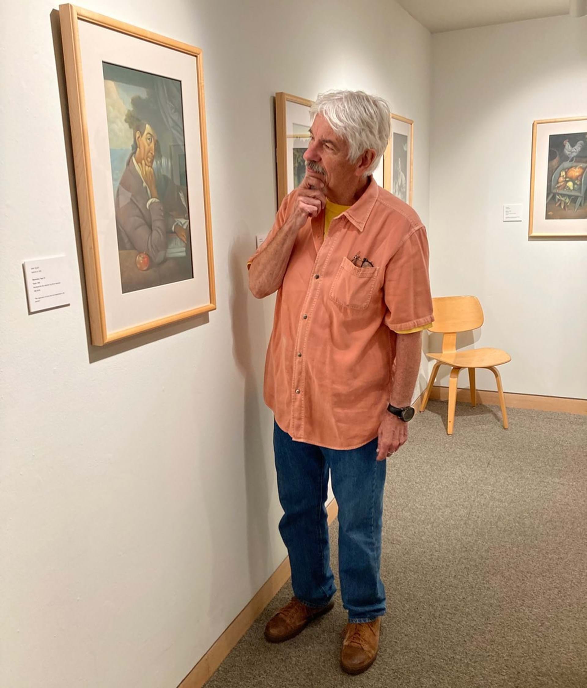 World renown artist Gary Kelley, in Dresser-Robinson Gallery viewing his artwork created in 1990 for Washington Irving's novel, The Legend of Sleepy Hollow.