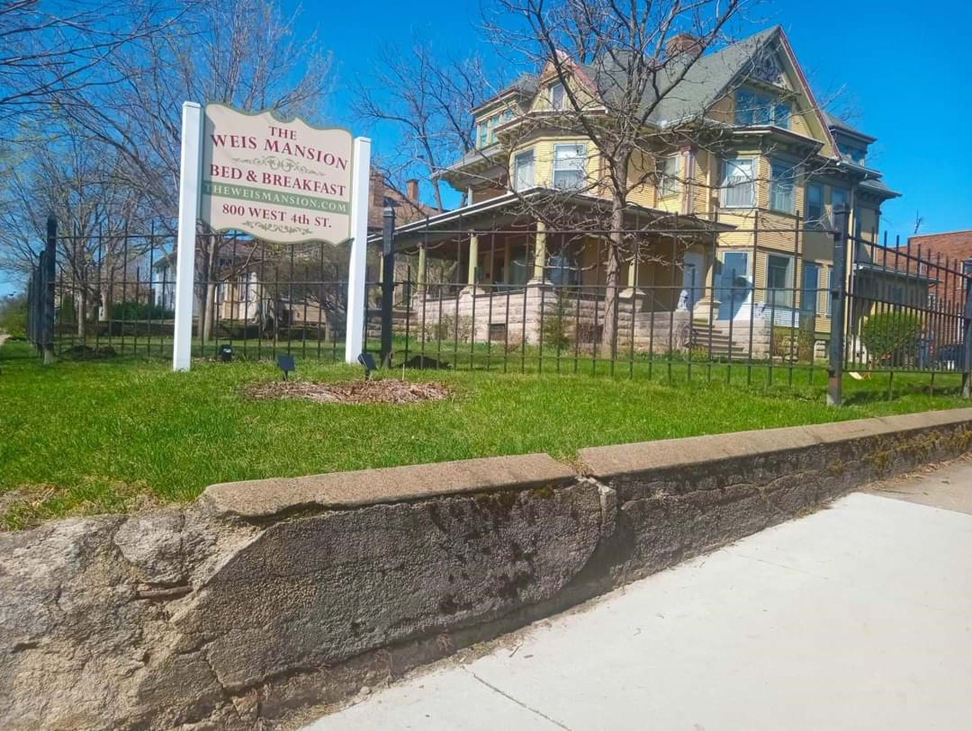 The Weis Mansion with historic fence