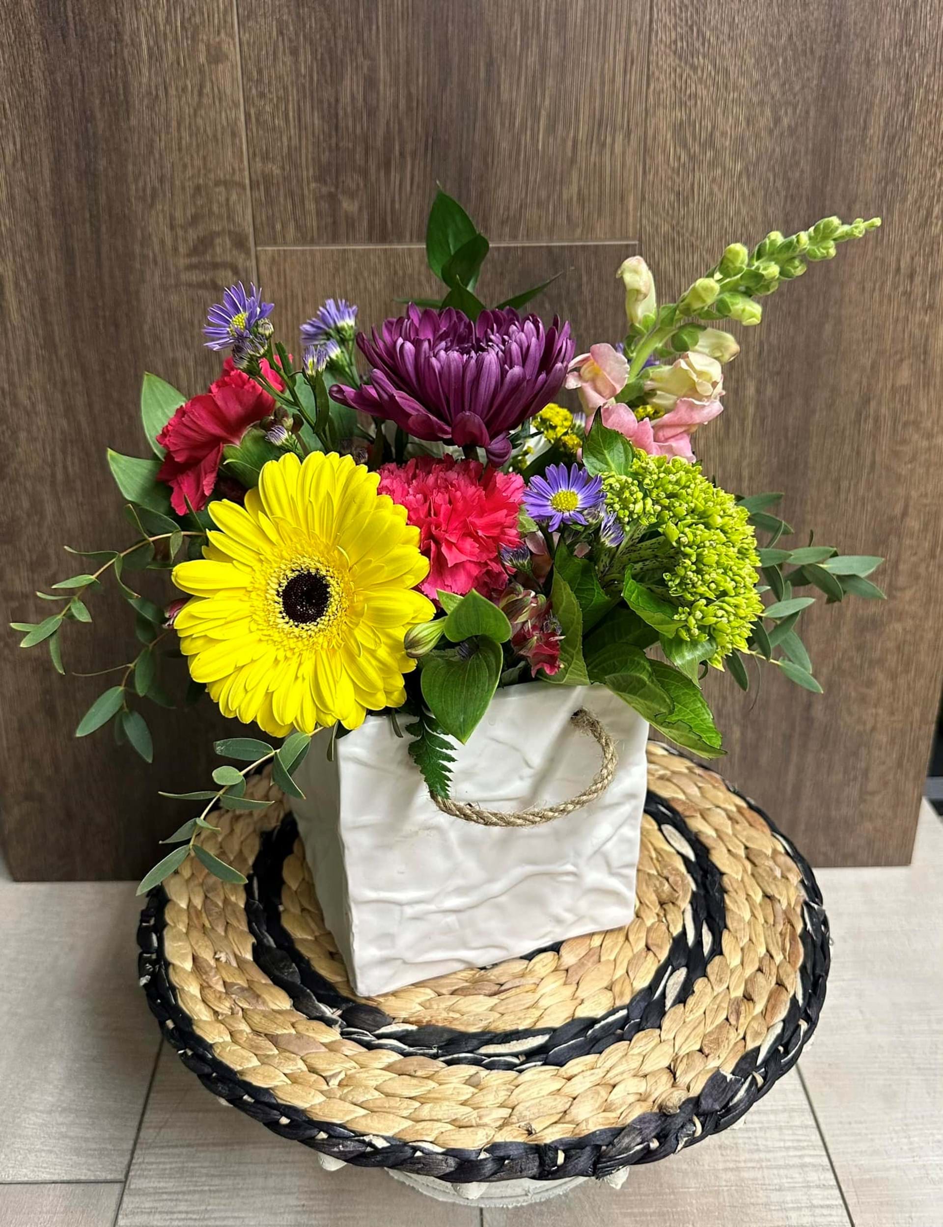 A Colors Floral & Home Decorating Floral Arrangement