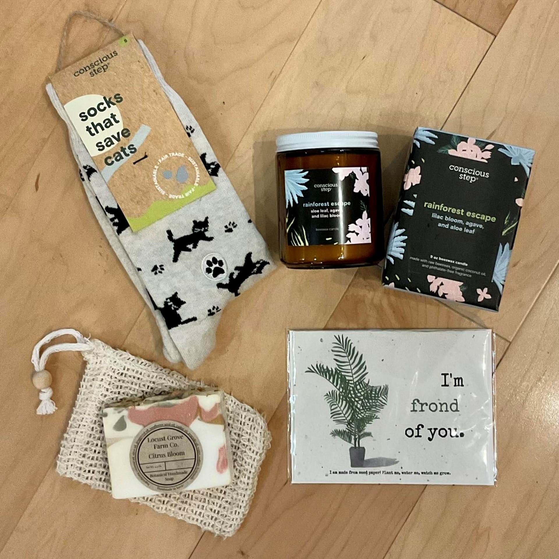 Perfect Gift for your special someone: Socks that Save, Candle that Saves, Plantable card, and Iowa made soap