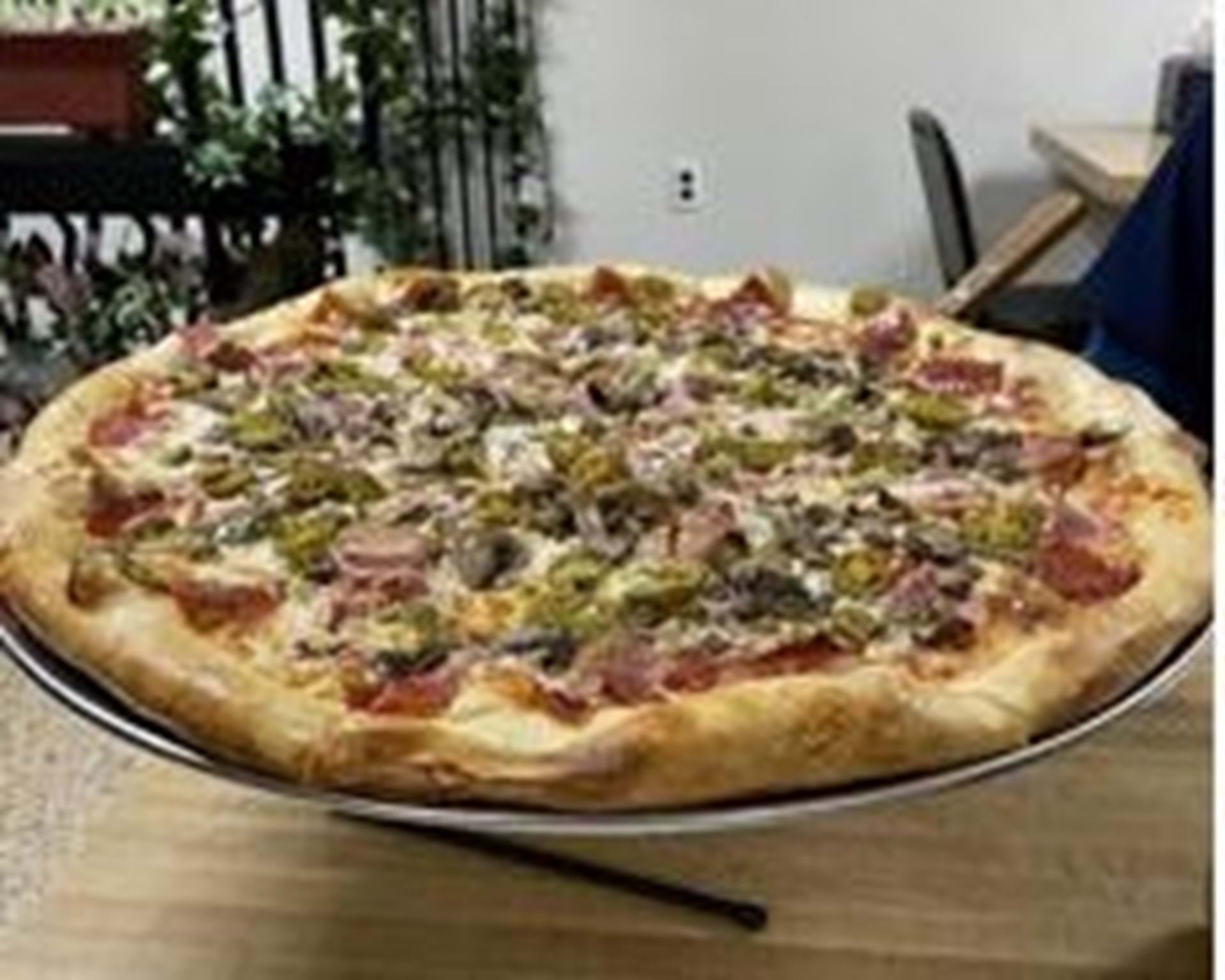Fresh to order pizza. Fresh ground meats and from scratch crust. Hawiian has a homemade pineapple sauce. 