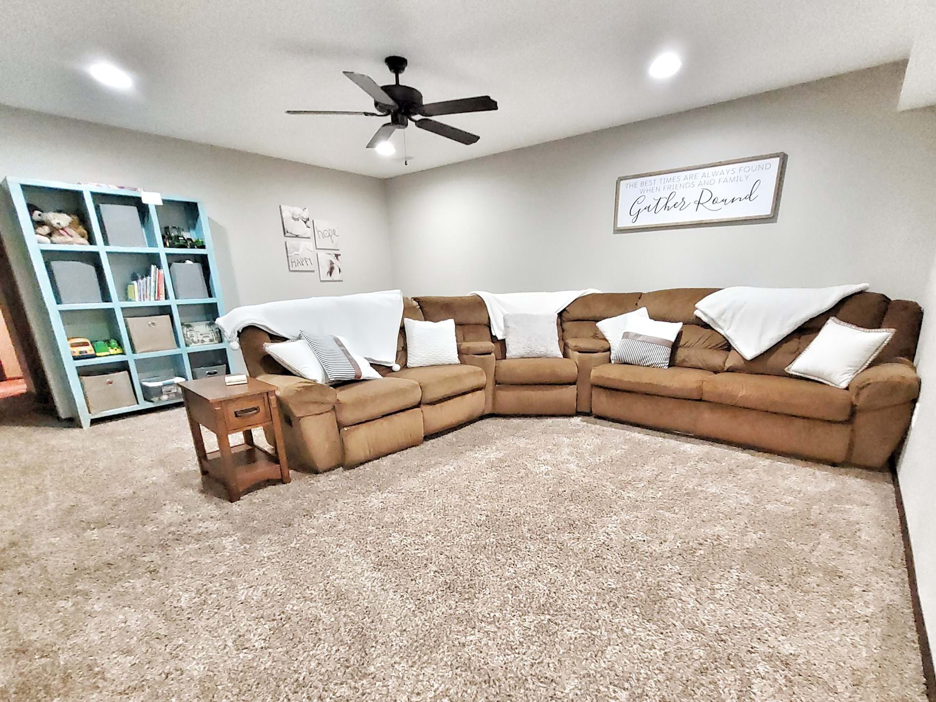 Large basement with lots of kid toys and pull out couch