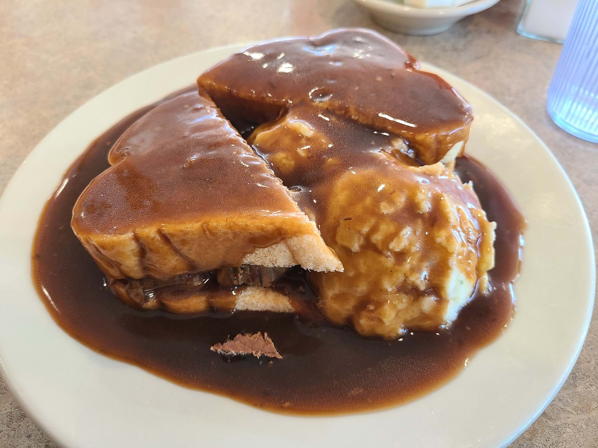 Hot beef sandwhich with a double order of potatoes!