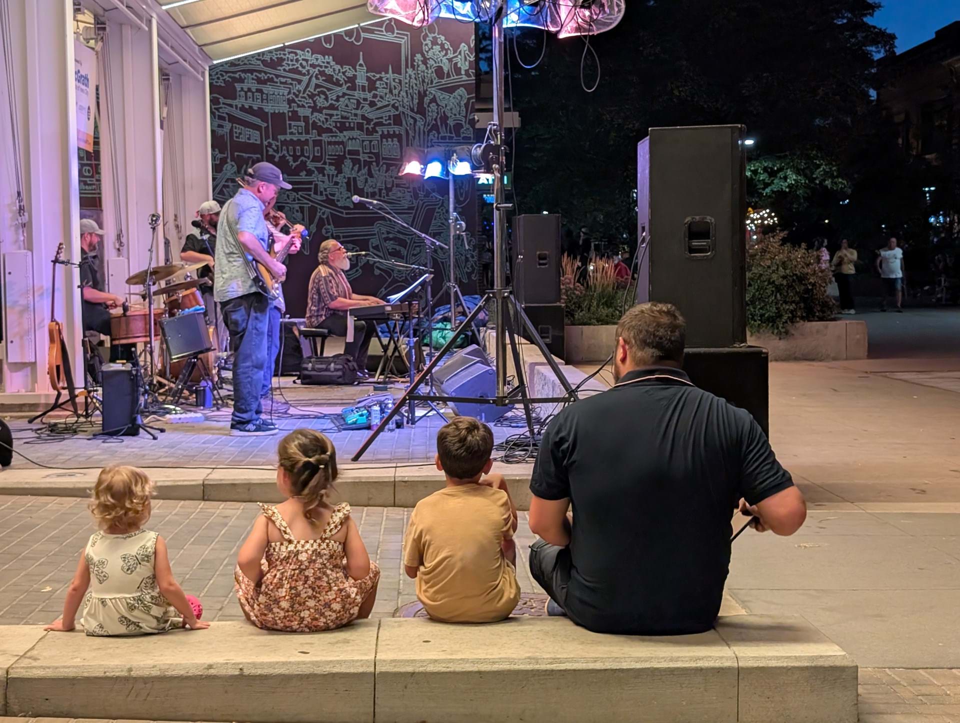 Family watching a Friday Night Concert