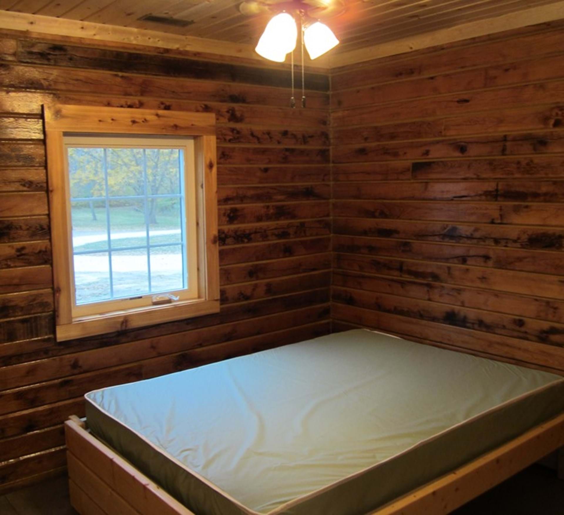 One of the bedrooms in the Legacy Cabin