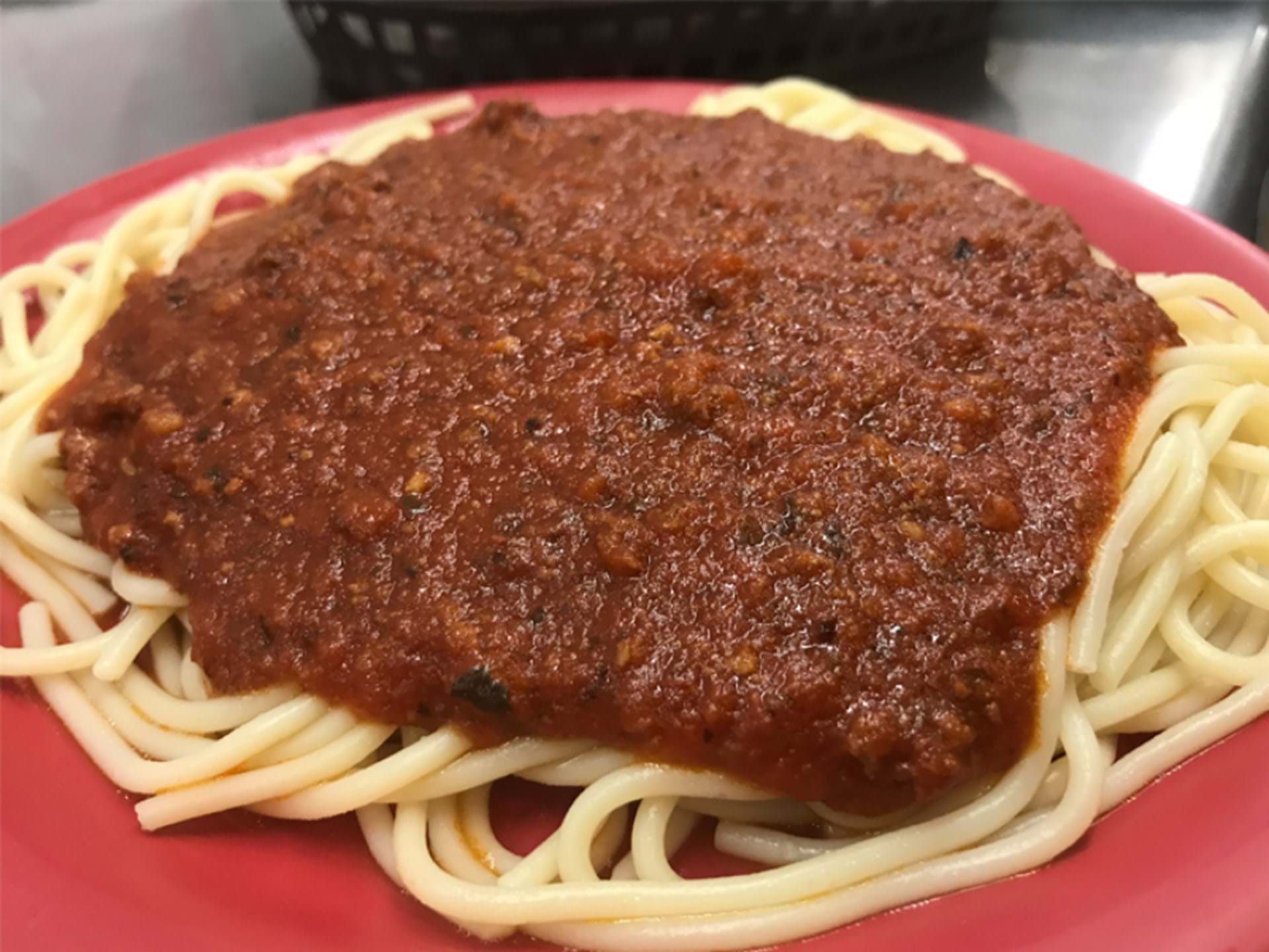 Spaghetti topped homemade meat sauce