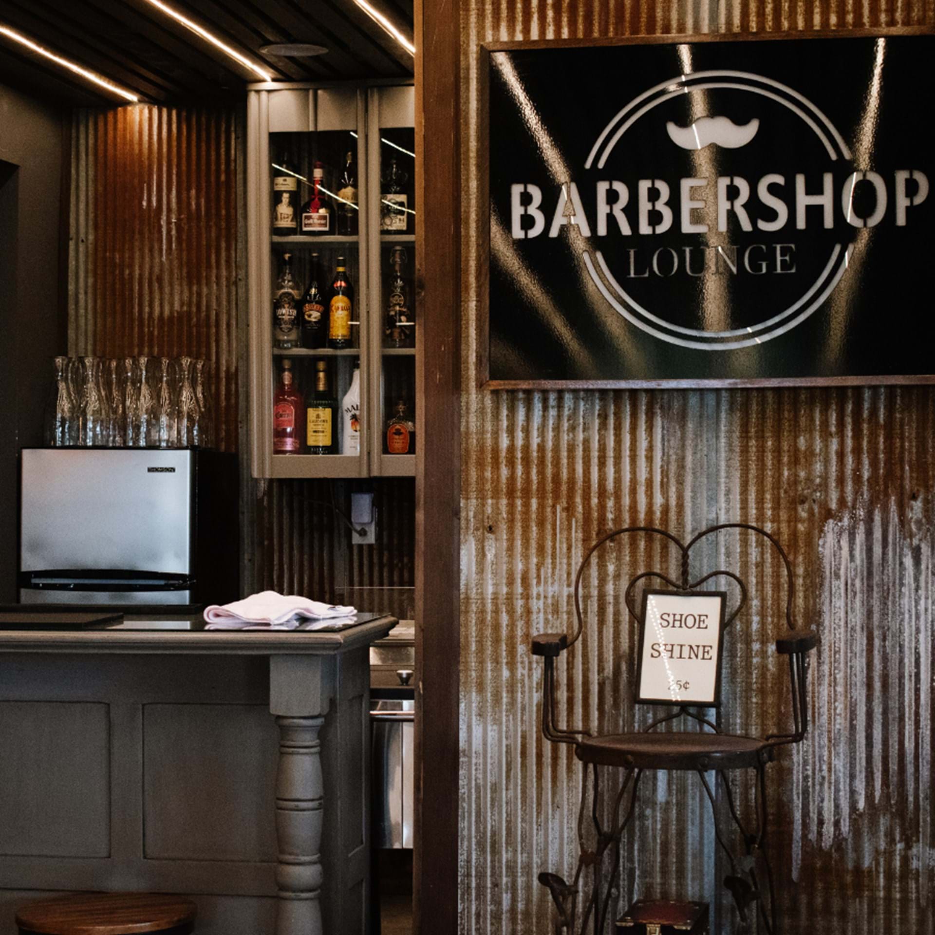 The BARbershop Lounge at Alta House is a chic gathering spot where friends sip, mingle, and make every moment memorable.