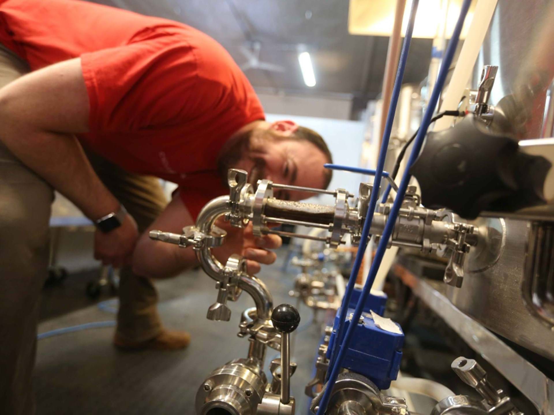 Owner Justin Merritt brews a batch 