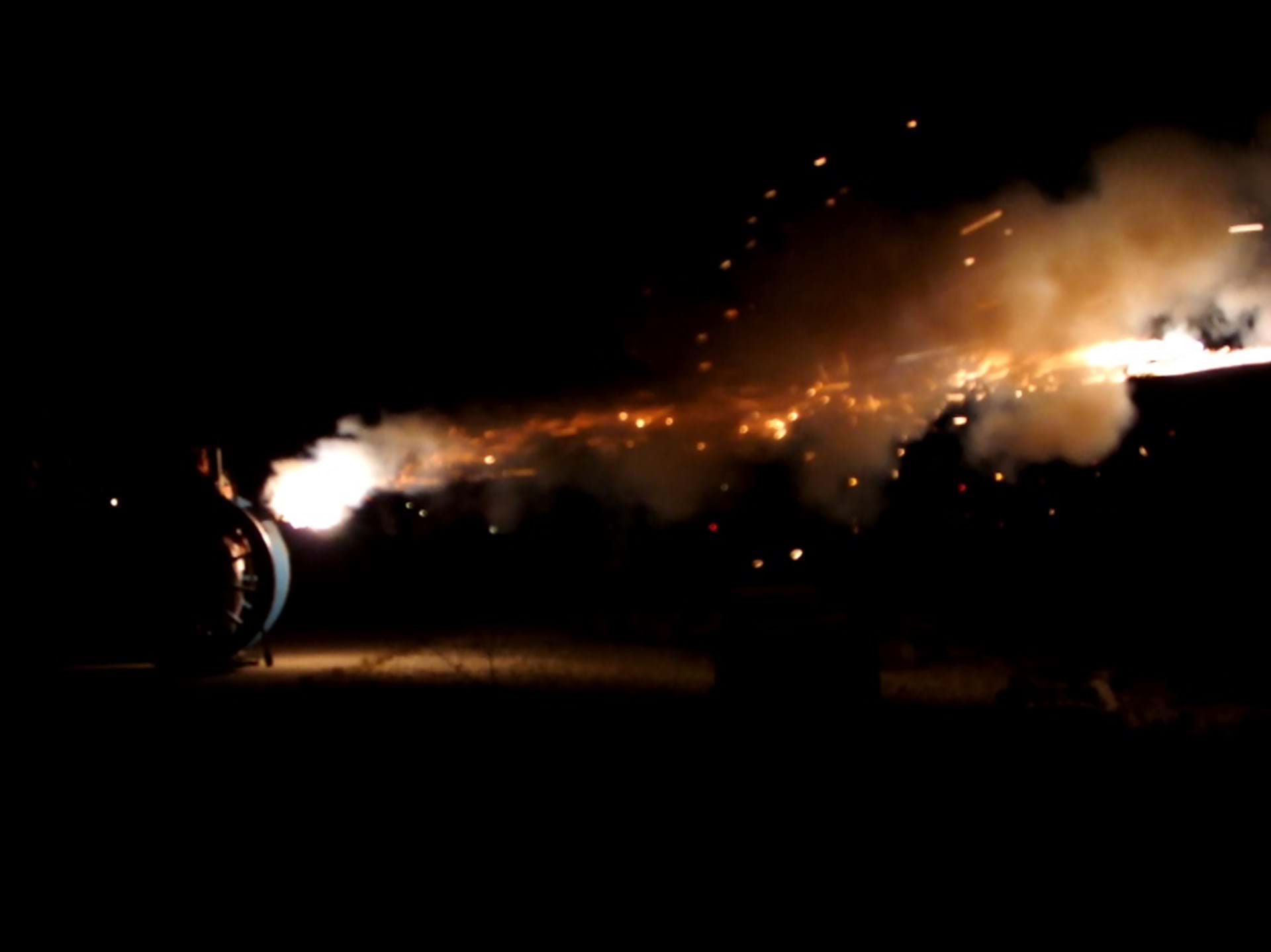 After dark cannon shooting blazing across the Mississippi RIver.  